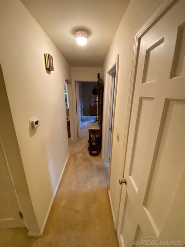 1782 Hollywood St, Grosse Pointe Woods, MI 48236 - corridor featuring light carpet and baseboards