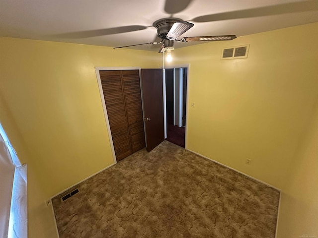 23072 Rein Ave, Eastpointe, MI 48021 - unfurnished bedroom with a closet, carpet flooring, and a ceiling fan