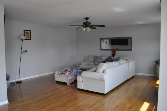 9180 Woodridge Dr, Davison, MI 48423 - living room featuring a ceiling fan and wood finished floors