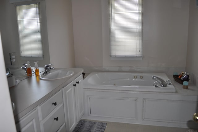 9180 Woodridge Dr, Davison, MI 48423 - bathroom with a jetted tub and vanity