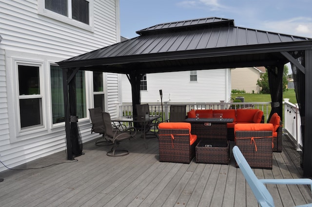 9180 Woodridge Dr, Davison, MI 48423 - wooden terrace with a gazebo, outdoor dining area, and an outdoor living space