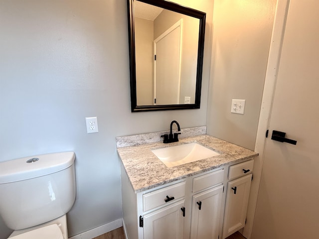 3331 Lakeshore Dr, Gladwin, MI 48624 - bathroom with vanity and toilet