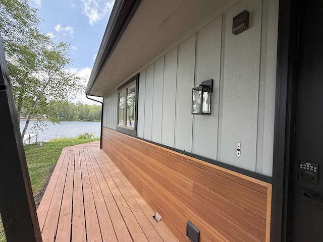 3331 Lakeshore Dr, Gladwin, MI 48624 - deck featuring a water view