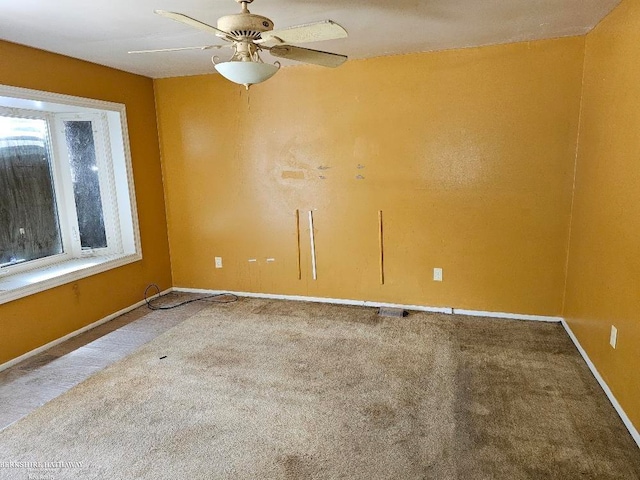 7251 Studebaker Ave, Warren, MI 48091 - carpeted spare room featuring a ceiling fan and baseboards