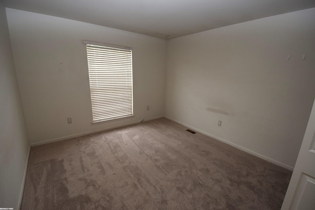 11186 Spruce Ct Unit 105, Washington Twp, MI 48094 - empty room featuring light colored carpet
