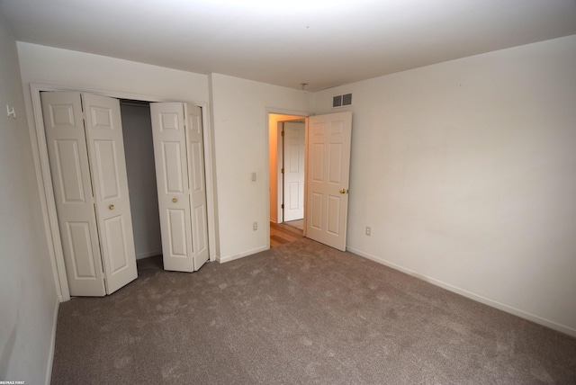 11186 Spruce Ct Unit 105, Washington Twp, MI 48094 - unfurnished bedroom with carpet and a closet