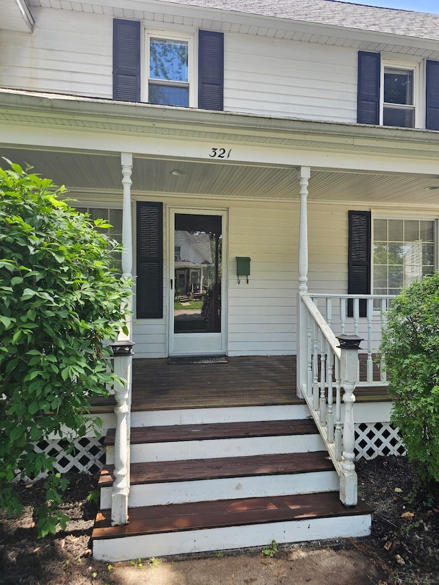 321 Lamson St, Grand Ledge, MI 48837 - entrance to property with covered porch