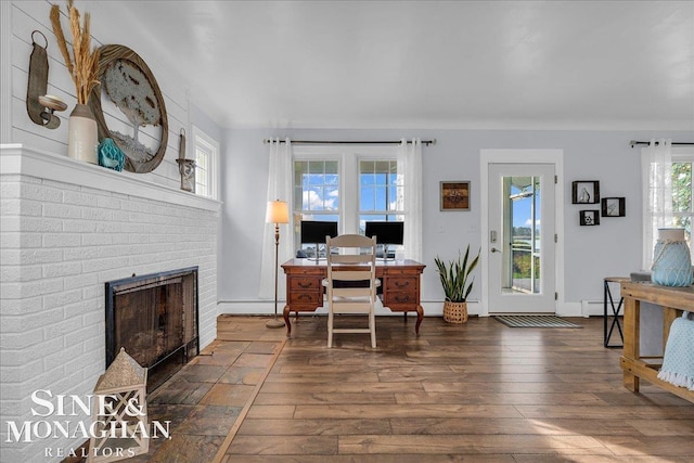 421 Edgewater Dr, Algonac, MI 48001 - office space featuring hardwood / wood-style flooring, a brick fireplace, and baseboard heating
