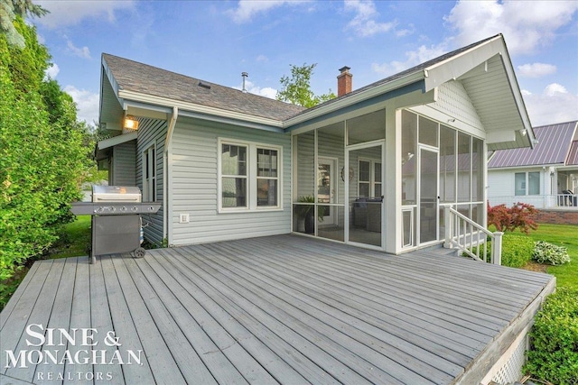 421 Edgewater Dr, Algonac, MI 48001 - deck featuring a sunroom and grilling area