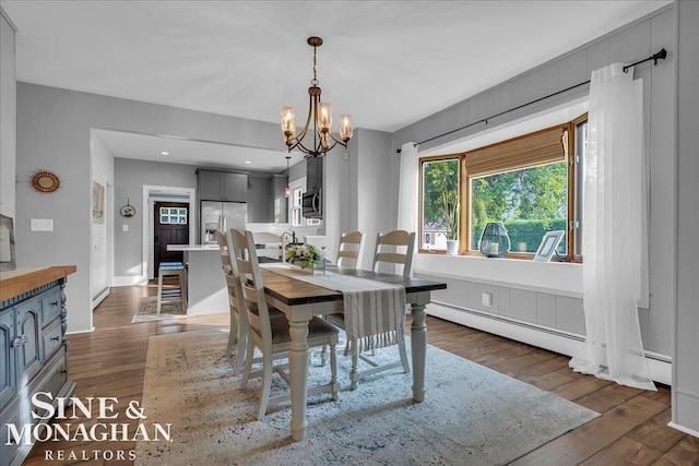 421 Edgewater Dr, Algonac, MI 48001 - dining room with a chandelier, a baseboard radiator, dark wood finished floors, and recessed lighting