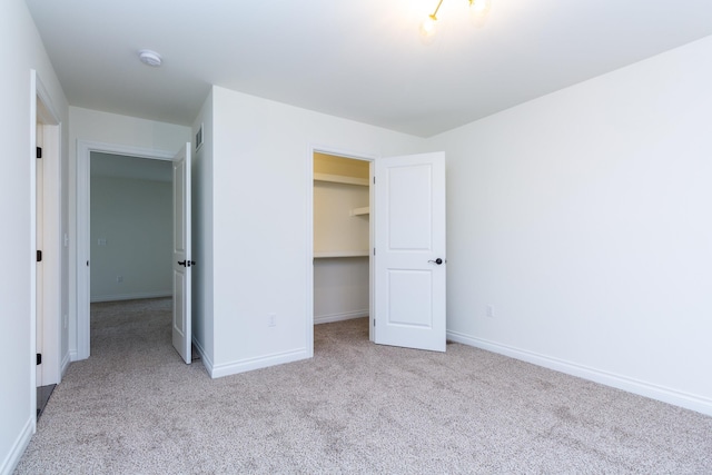 27602 Maryjane Ln E, Chesterfield Twp, MI 48047 - unfurnished bedroom featuring carpet floors, a spacious closet, and a closet