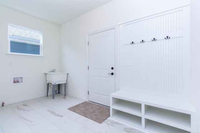 27602 Maryjane Ln E, Chesterfield Twp, MI 48047 - mudroom featuring marble finish flooring and baseboards