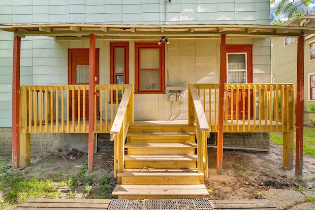 734 Court St, Port Huron, MI 48060 - doorway to property featuring covered porch