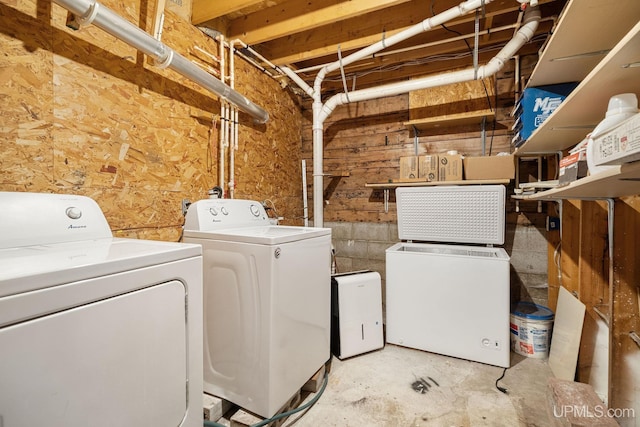 719 S Carlshend Rd, Skandia, MI 49885 - washroom with separate washer and dryer