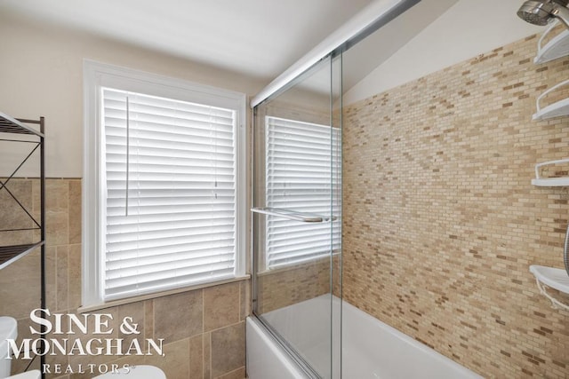 1387 Torrey Rd, Grosse Pointe Woods, MI 48236 - bathroom with tile walls and combined bath / shower with glass door