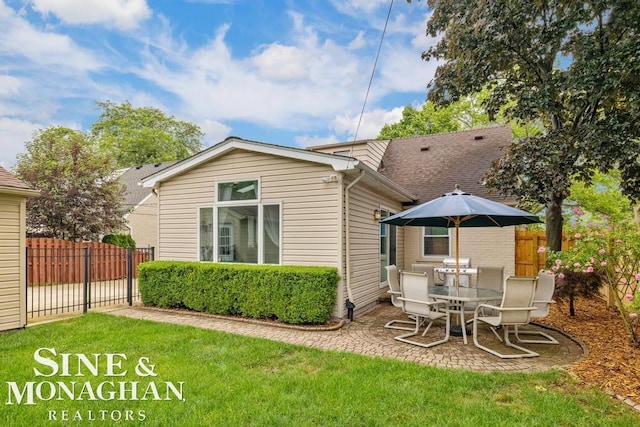 1387 Torrey Rd, Grosse Pointe Woods, MI 48236 - rear view of house with a patio