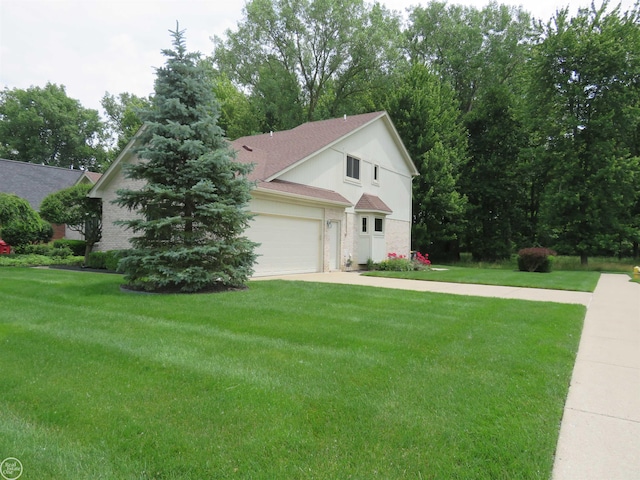 46778 Tiffin Ct, Chesterfield, MI 48047 - view of front of house featuring an attached garage, a front lawn, concrete driveway, and a shingled roof