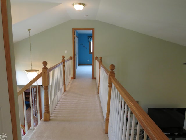 46778 Tiffin Ct, Chesterfield, MI 48047 - hall featuring an upstairs landing, vaulted ceiling, and light carpet