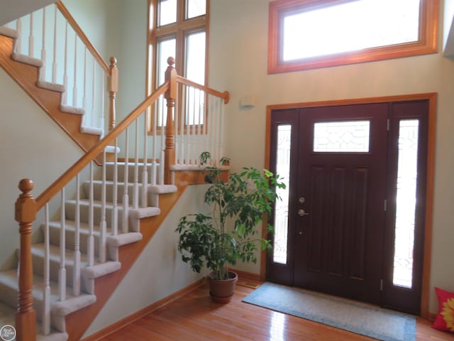 46778 Tiffin Ct, Chesterfield, MI 48047 - entryway featuring wood finished floors and stairway