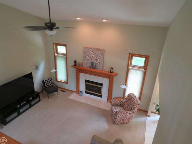 46778 Tiffin Ct, Chesterfield, MI 48047 - living room featuring a premium fireplace, plenty of natural light, a ceiling fan, and light carpet