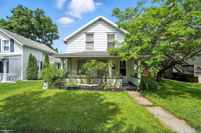 618 Harrison St, Monroe, MI 48161 - view of front of home with a front lawn