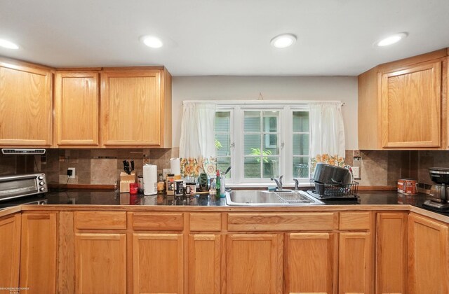 618 Harrison St, Monroe, MI 48161 - kitchen with decorative backsplash and recessed lighting