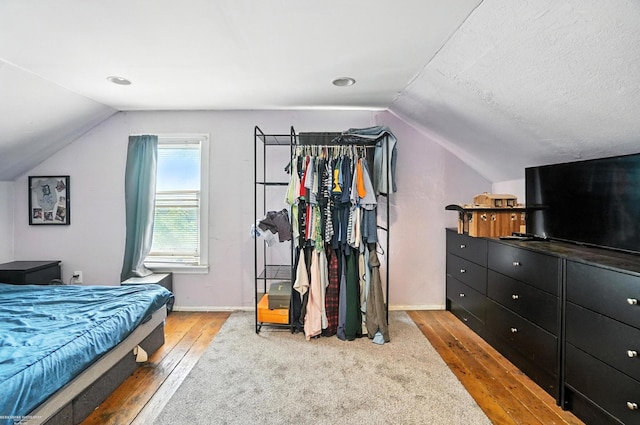 618 Harrison St, Monroe, MI 48161 - bedroom with lofted ceiling and hardwood / wood-style flooring