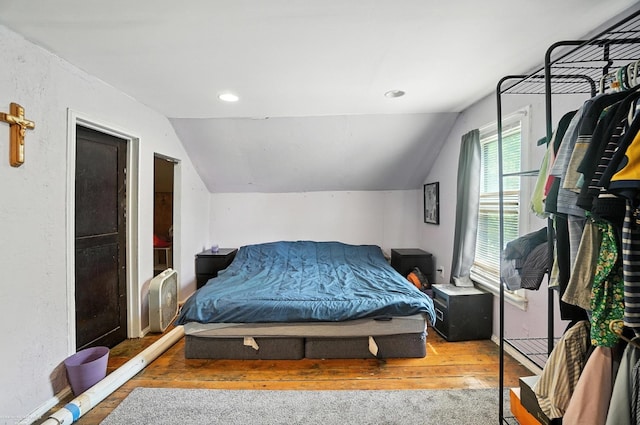 618 Harrison St, Monroe, MI 48161 - bedroom featuring hardwood / wood-style flooring, vaulted ceiling, and recessed lighting