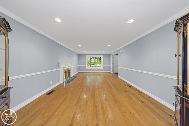 870 Crescent Ln, Grosse Pointe Woods, MI 48236 - unfurnished living room with recessed lighting, light wood-style floors, a high end fireplace, and crown molding