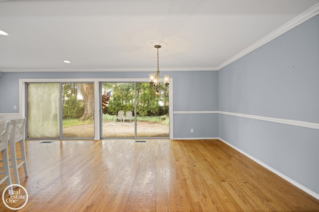 870 Crescent Ln, Grosse Pointe Woods, MI 48236 - unfurnished room featuring a chandelier, crown molding, wood finished floors, and recessed lighting