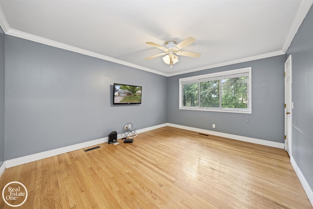 870 Crescent Ln, Grosse Pointe Woods, MI 48236 - unfurnished room featuring wood finished floors, a ceiling fan, and crown molding