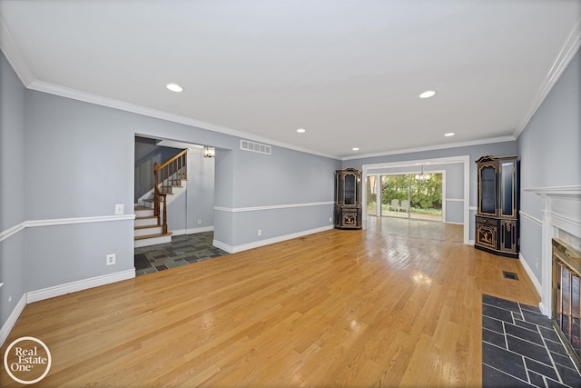 870 Crescent Ln, Grosse Pointe Woods, MI 48236 - unfurnished living room with a fireplace, recessed lighting, stairway, ornamental molding, and wood finished floors