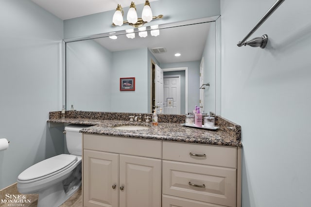 388 Lincoln Rd, Grosse Pointe, MI 48230 - half bath with vanity and toilet