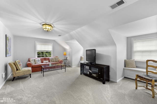 388 Lincoln Rd, Grosse Pointe, MI 48230 - living area with carpet floors and vaulted ceiling