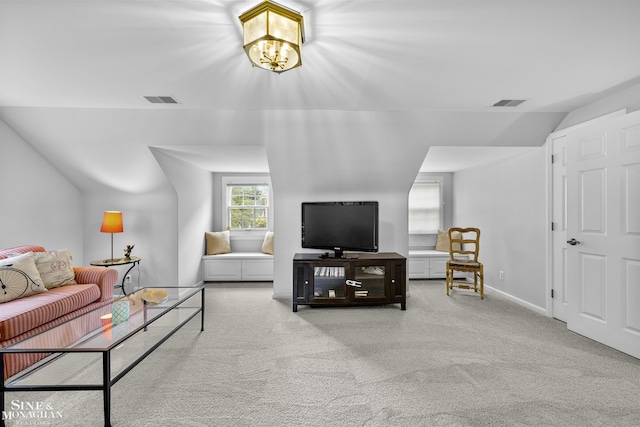 388 Lincoln Rd, Grosse Pointe, MI 48230 - living area with vaulted ceiling, carpet floors, and a chandelier