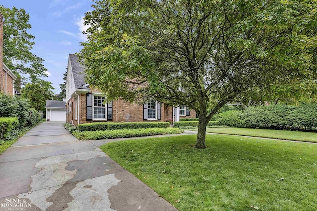 388 Lincoln Rd, Grosse Pointe, MI 48230 - view of property hidden behind natural elements with brick siding and a front lawn