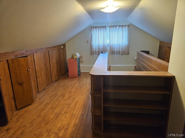 619 N 7th St, Ontonagon, MI 49953 - additional living space featuring light wood-style floors and vaulted ceiling