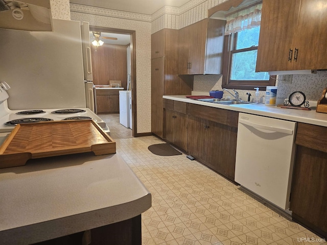 619 N 7th St, Ontonagon, MI 49953 - kitchen featuring white appliances, wallpapered walls, ventilation hood, light floors, and light countertops