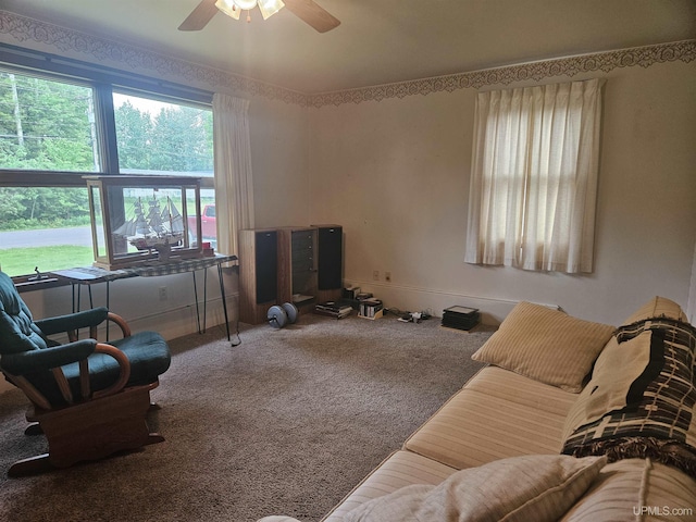 619 N 7th St, Ontonagon, MI 49953 - living room with a ceiling fan and carpet floors