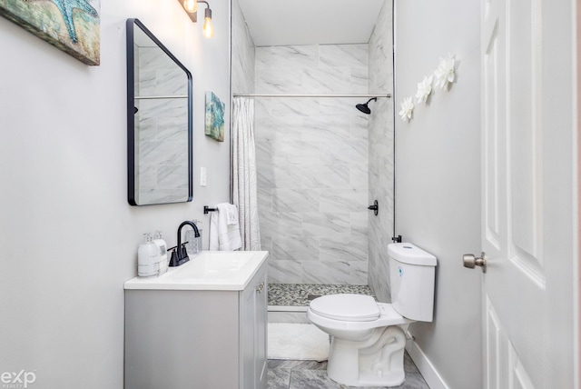 2513 Concord St, Detroit, MI 48207 - full bath with marble look tile flooring, vanity, and a stall shower