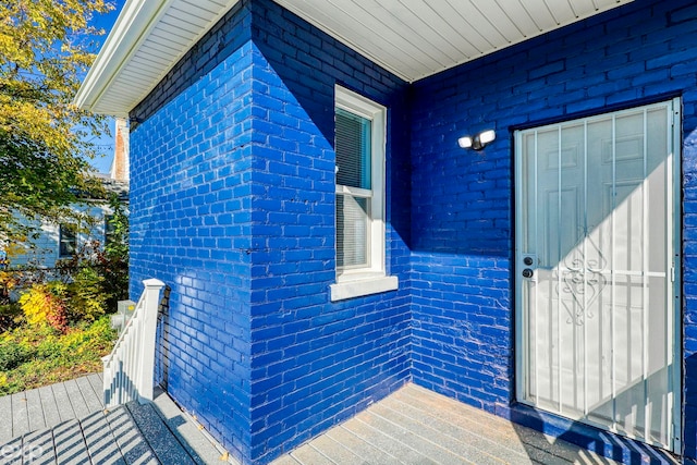 2513 Concord St, Detroit, MI 48207 - view of exterior entry featuring brick siding