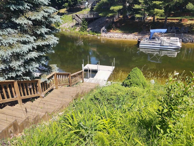 3601 Huckleberry Trl, Farwell, MI 48622 - dock area featuring a water view