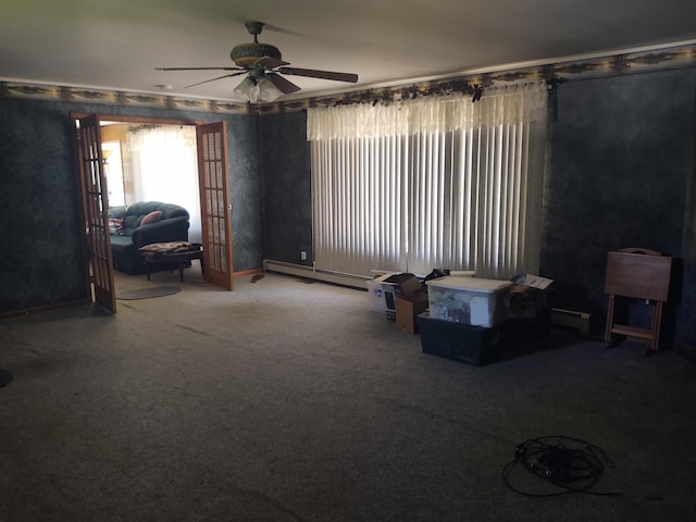 3601 Huckleberry Trl, Farwell, MI 48622 - carpeted living area featuring ceiling fan and baseboard heating