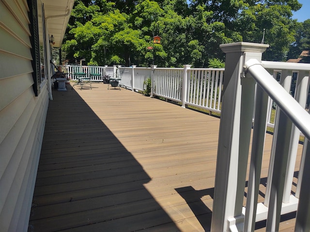 3601 Huckleberry Trl, Farwell, MI 48622 - wooden terrace with view of wooded area