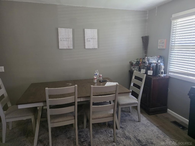 7283 S Fork Dr, Swan Creek, MI 48473 - dining area featuring wood finished floors and baseboards