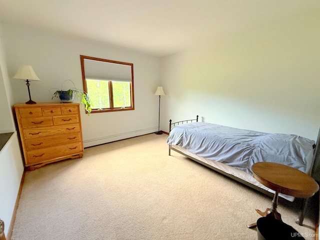 21805 Number 9 Rd, Hancock, MI 49930 - bedroom featuring baseboard heating and light colored carpet