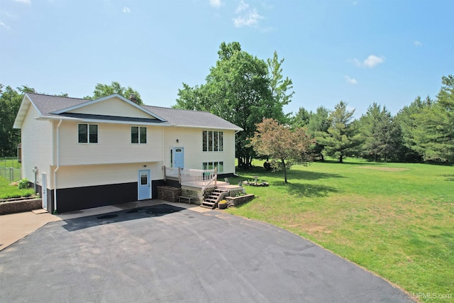 21805 Number 9 Rd, Hancock, MI 49930 - view of front of house with a front yard, driveway, and roof with shingles