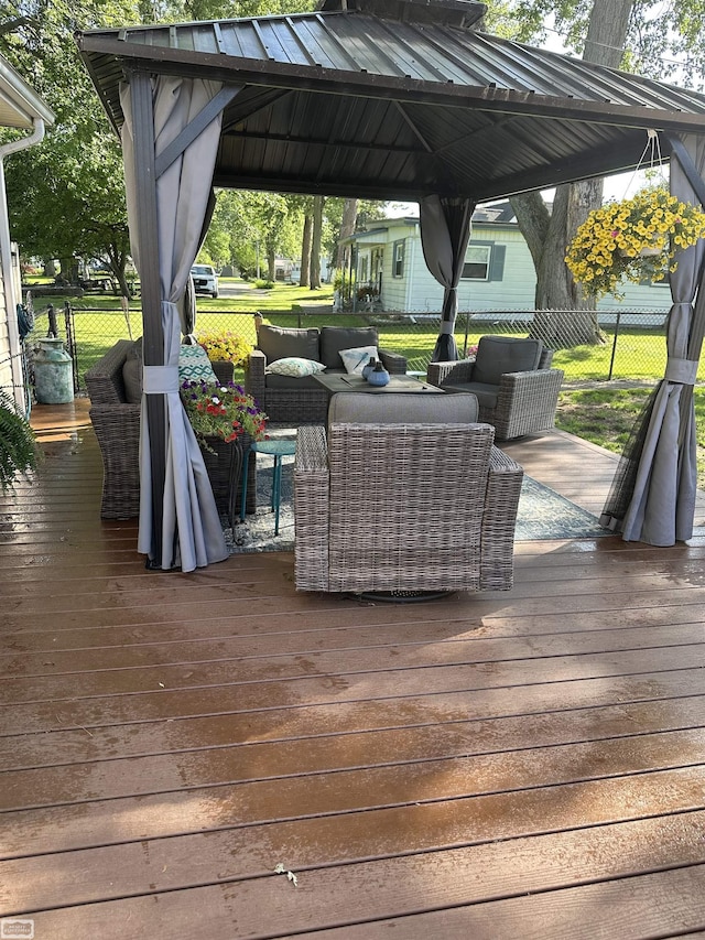 2100 Michigan St, Algonac, MI 48001 - wooden deck featuring a gazebo and an outdoor hangout area