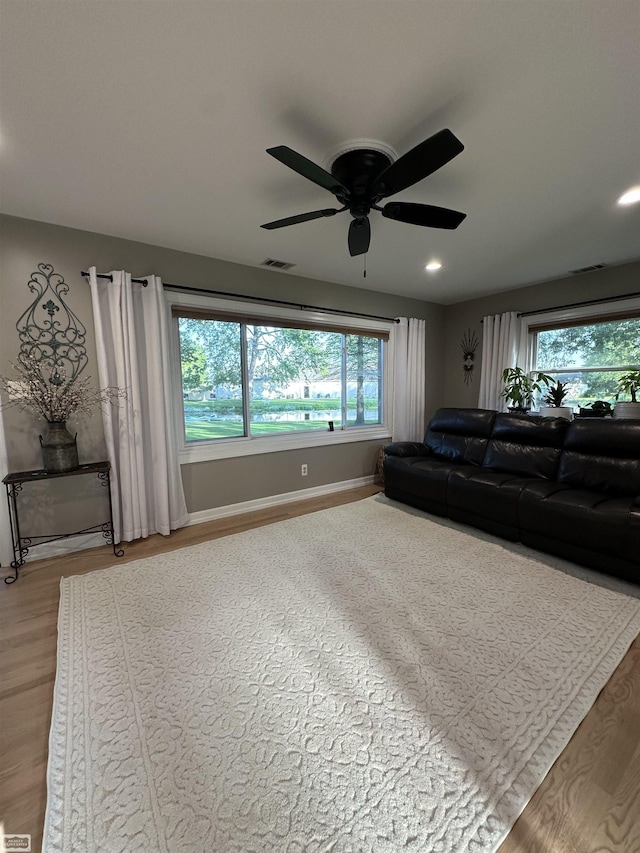 2100 Michigan St, Algonac, MI 48001 - living area featuring light wood finished floors, a ceiling fan, and recessed lighting