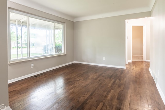 4444 Martin Rd, Warren, MI 48092 - empty room with dark wood-style flooring and baseboards